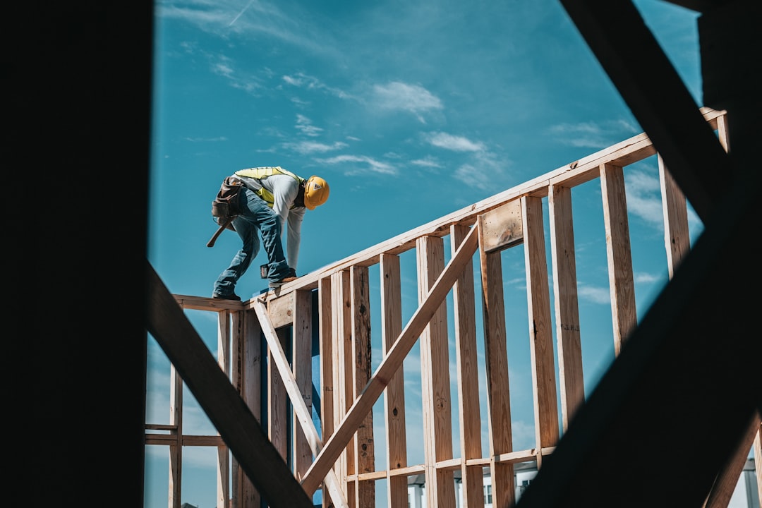 Construction professional inspecting a building